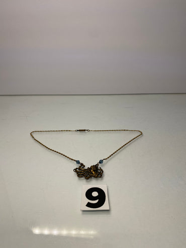 Golden Person Necklace