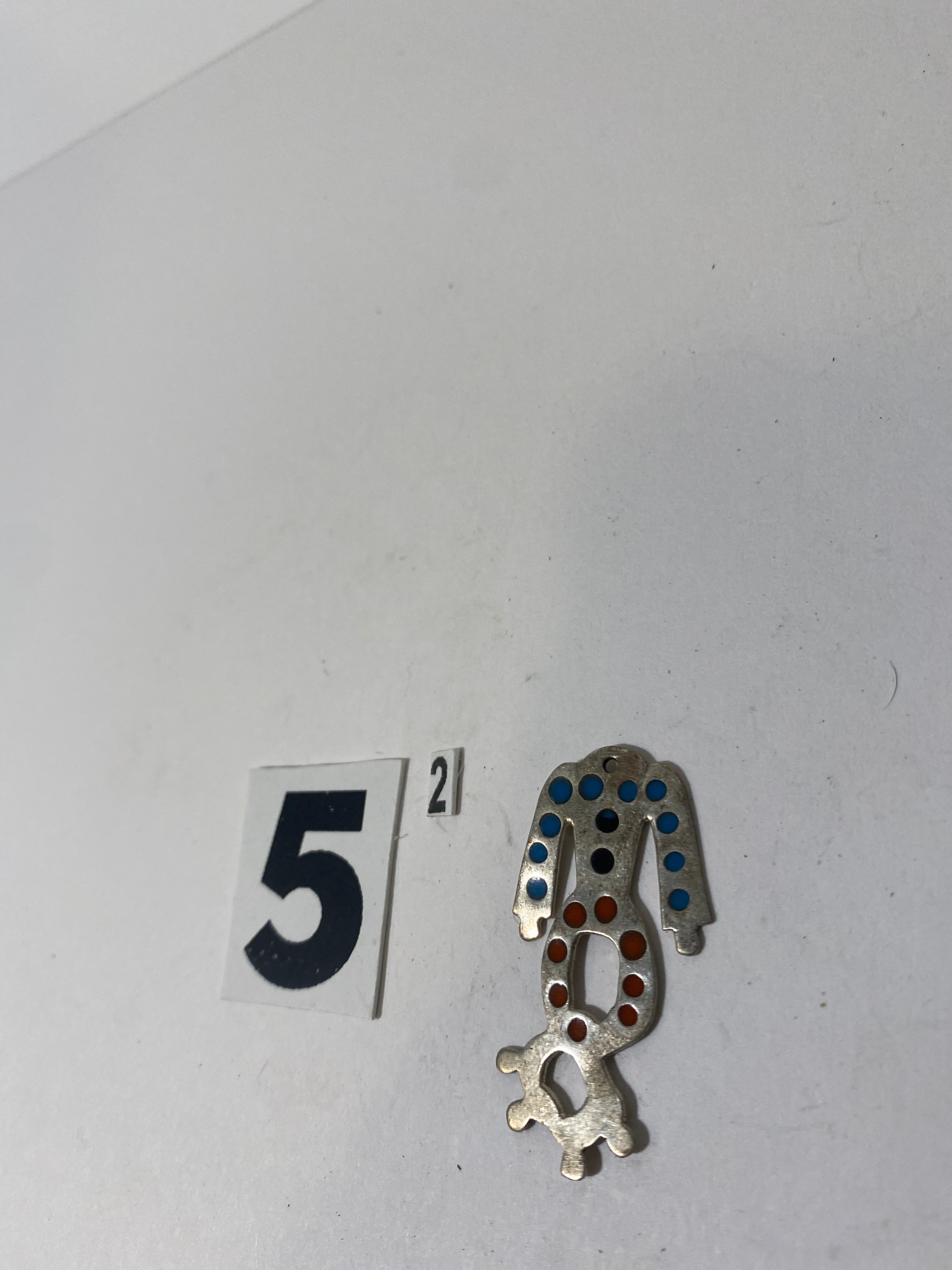 Headless Silver Tone Pendant