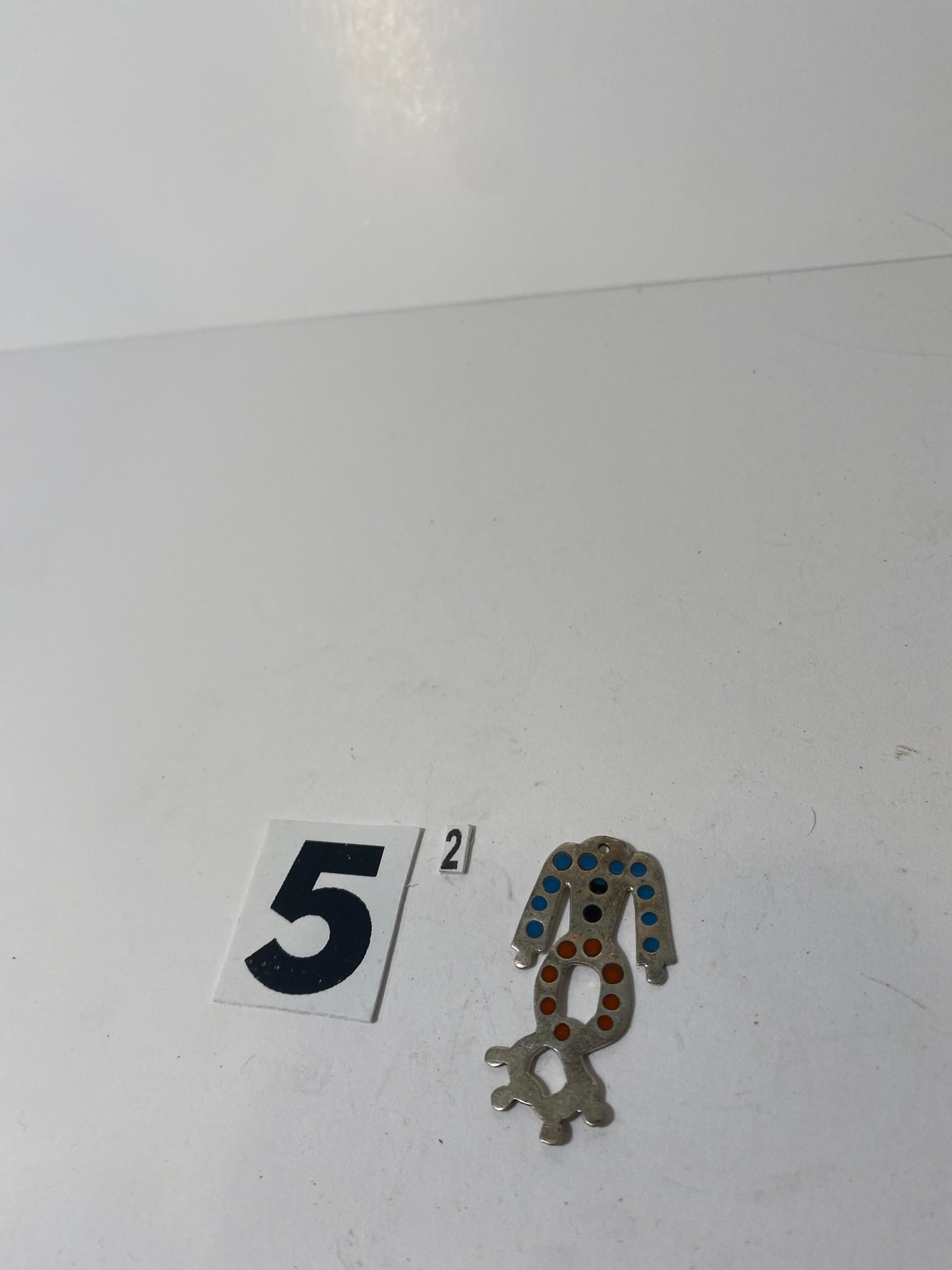 Headless Silver Tone Pendant