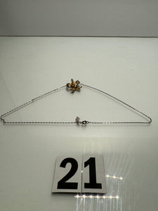 Chrome Bow Necklace